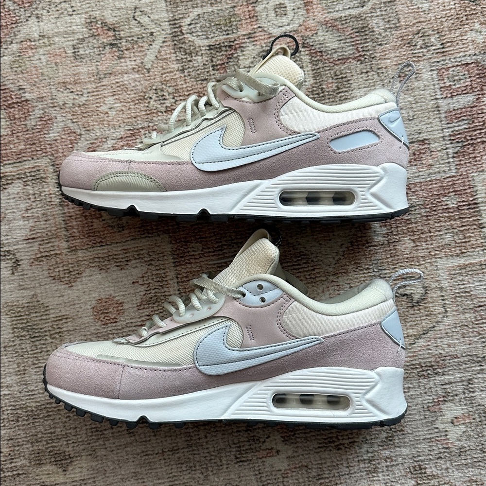 Woman’s Light Pink And White Nike Air Max